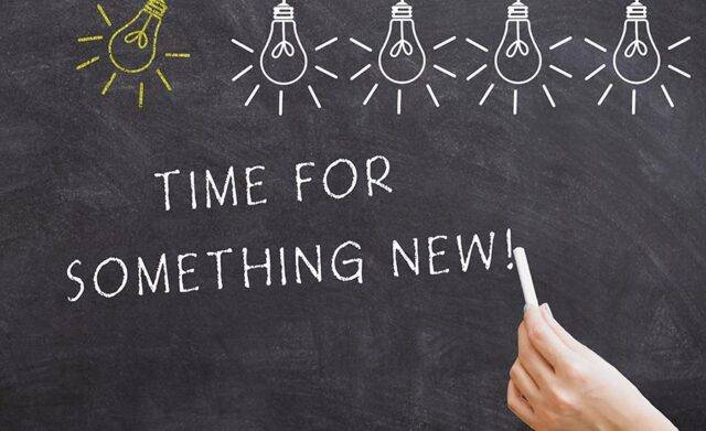 blackboard with time for something new written